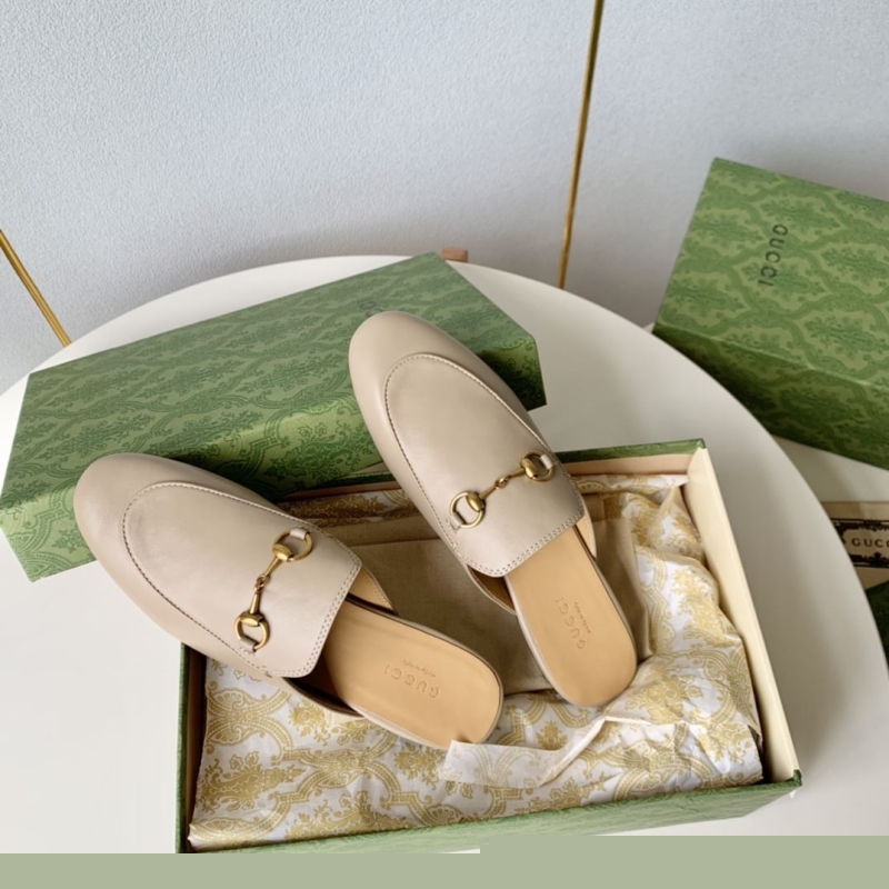 G*u*i slippers
